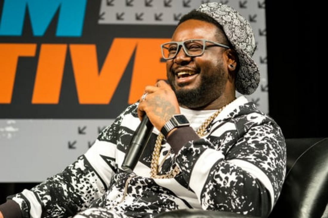 How many top 10 hits does T-Pain have?
