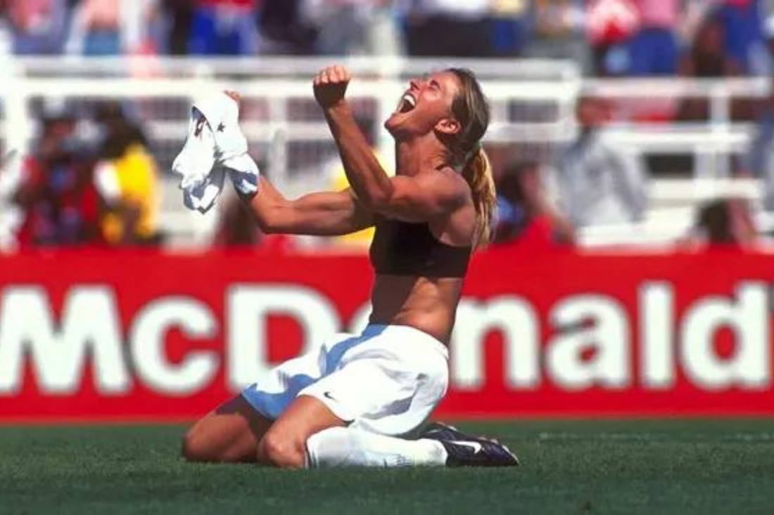 Who was the USA woman soccer player who took off her shirt?