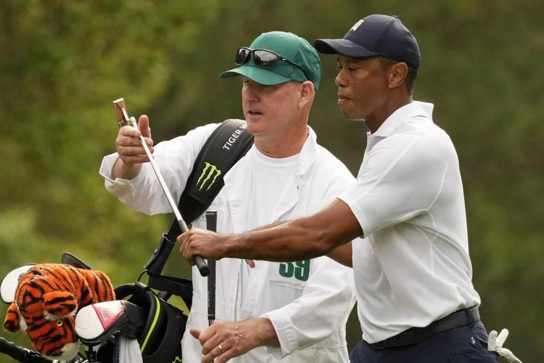 How much did Tiger Woods caddie make?