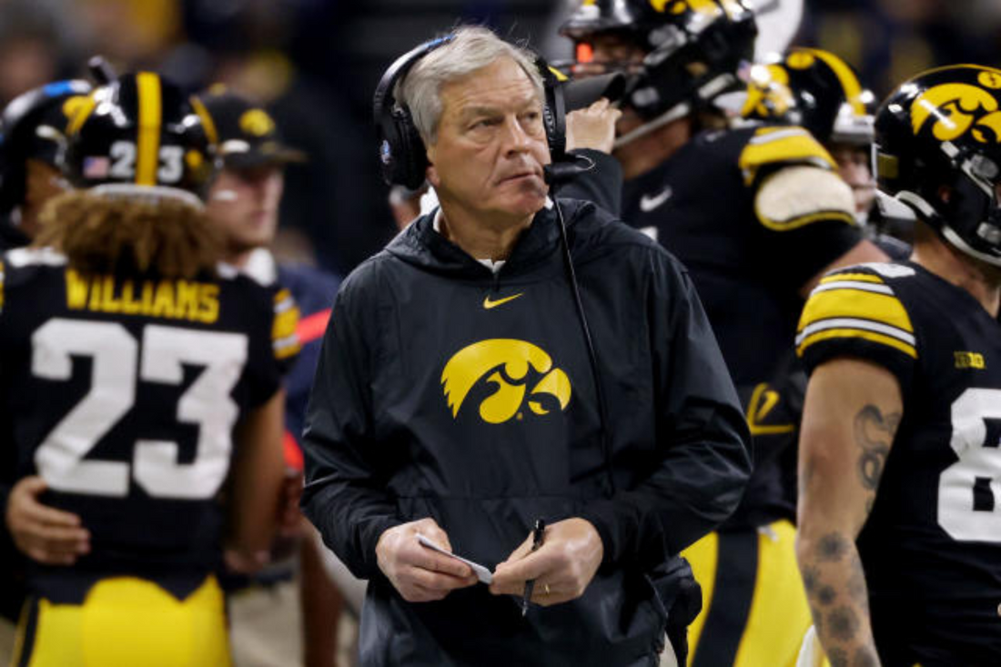 What position did Kirk Ferentz play in college?