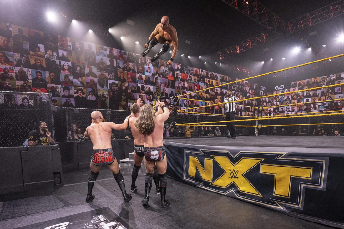 What is the relationship between NXT and WWE?
