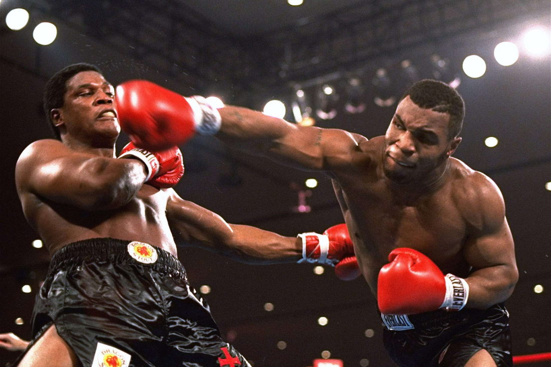 Mike Tyson vs. Muhammad Ali: A Legendary Clash