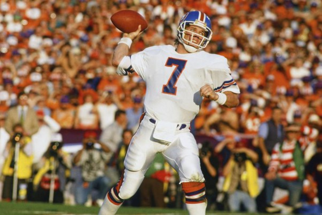 Why did John Elway refuse to play?