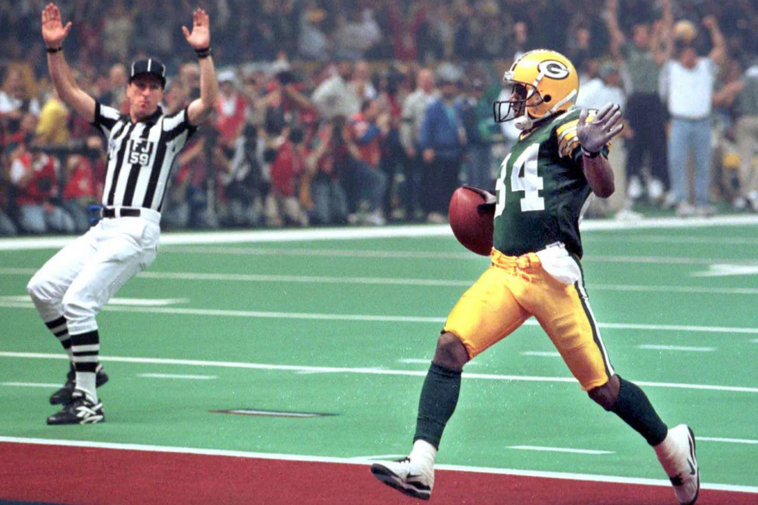 Who did Andre Rison win a Super Bowl with?