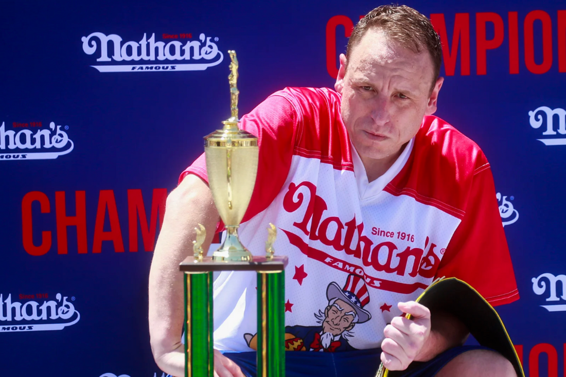 What is Joey Chestnut's real job?