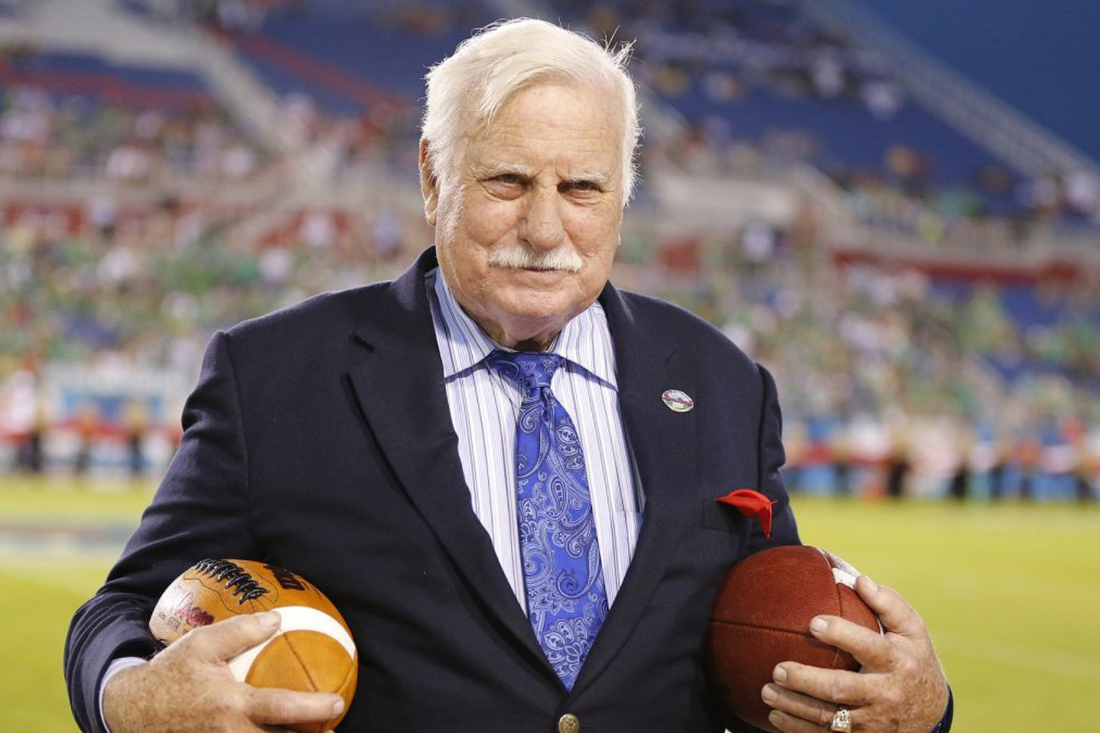 Why did Howard Schnellenberger leave Louisville?