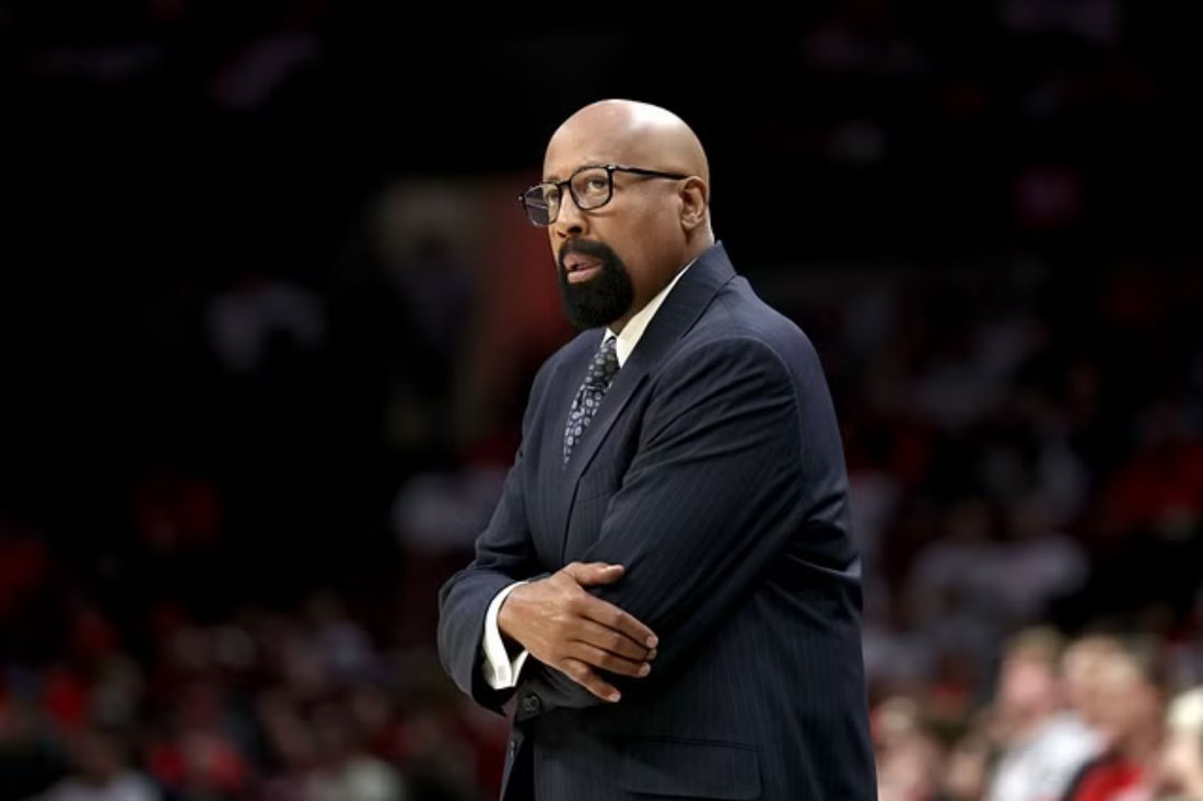 How much does Mike Woodson make?