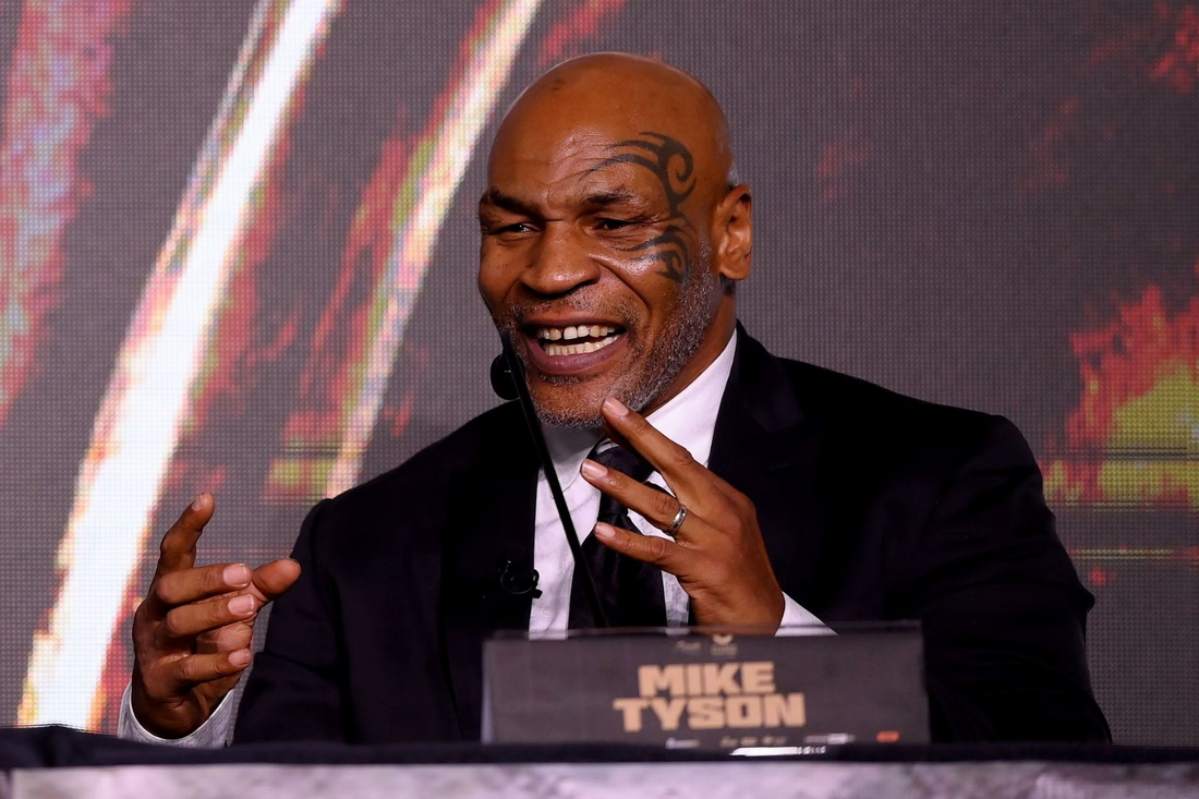 What did Mike Tyson's mother do for a Living?